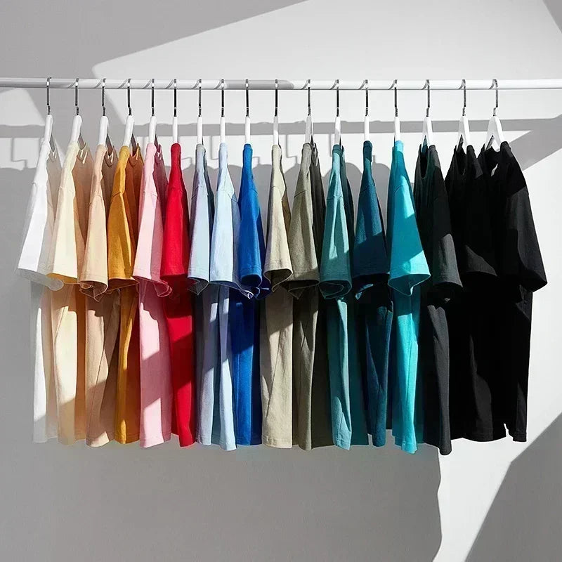 Colorful display of unisex cotton crew neck tees including the Pierce The Veil Band T-Shirt - Black Unisex Cotton Crew Neck Tee.